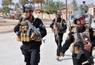 ارتش و نیروهای مردمی عراق بخش‌هایی از تکریت را آزاد کردند