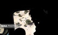 زیارت قبر شهید با هلی‌کوپتر پس از ۱۶ سال + عکس